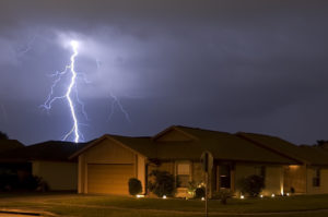 Lightning strike at night very near homes